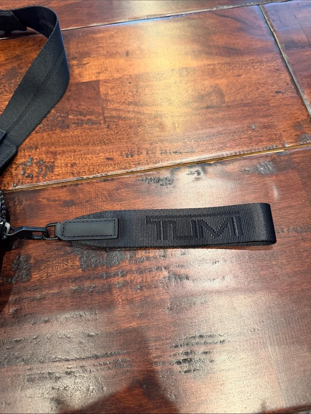 Tumi sling